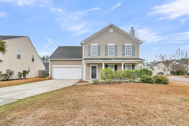 front of property featuring a garage, a front lawn, and a porch