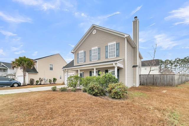 view of property with a porch and a front lawn