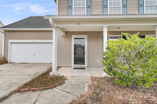 property entrance featuring a garage