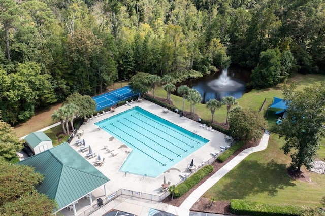 bird's eye view featuring a water view and a forest view