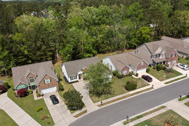 drone / aerial view with a view of trees