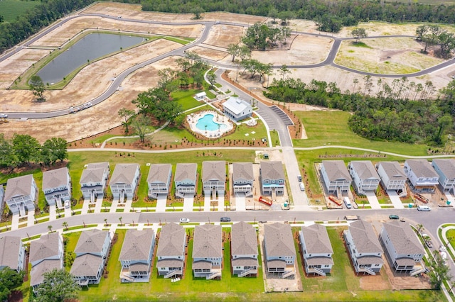 birds eye view of property featuring a residential view and a water view