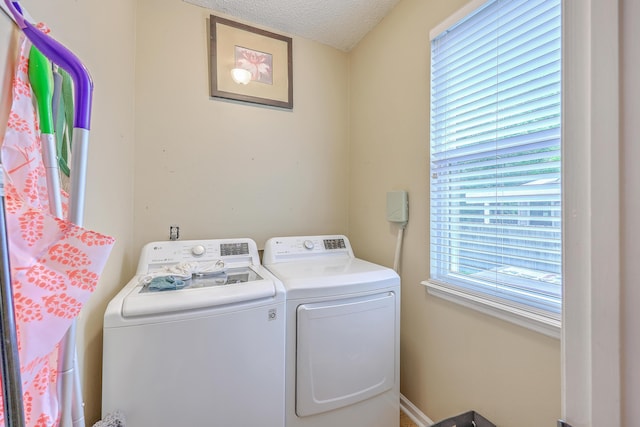 1972 Gray Battery Ct, Mount Pleasant, SC 29464 - laundry area with washing machine and clothes dryer and a textured ceiling