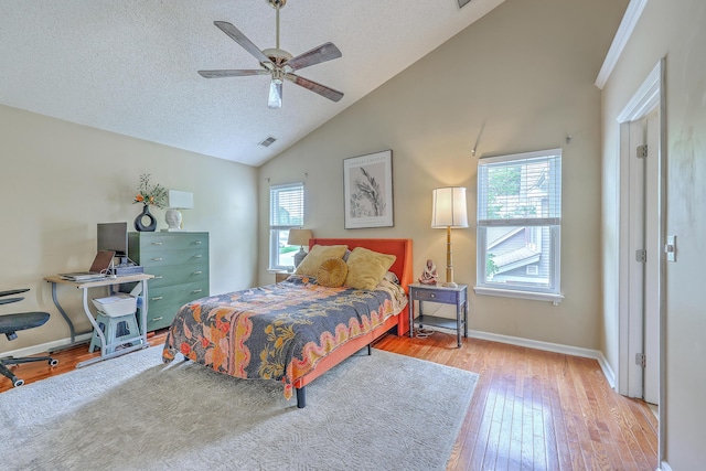 1972 Gray Battery Ct, Mount Pleasant, SC 29464 - bedroom with wood finished floors, high vaulted ceiling, a textured ceiling, and a ceiling fan
