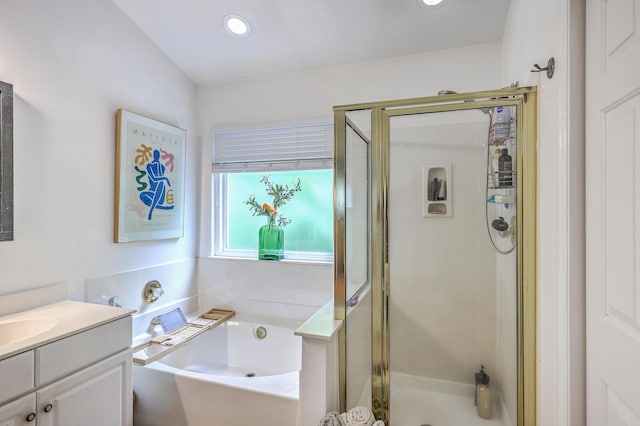 1972 Gray Battery Ct, Mount Pleasant, SC 29464 - bathroom featuring a stall shower, a garden tub, vanity, and recessed lighting