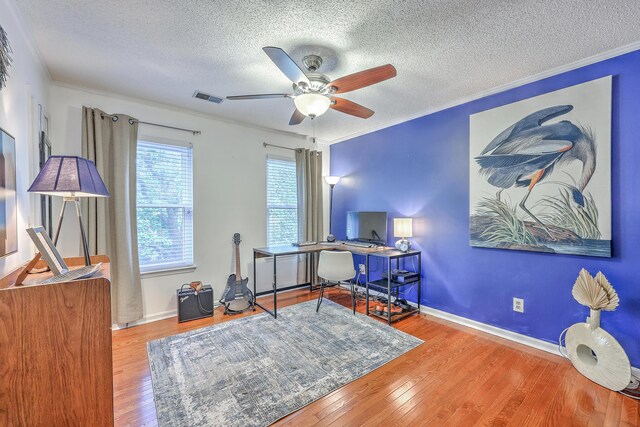 1972 Gray Battery Ct, Mount Pleasant, SC 29464 - home office with a textured ceiling, ceiling fan, wood finished floors, and ornamental molding
