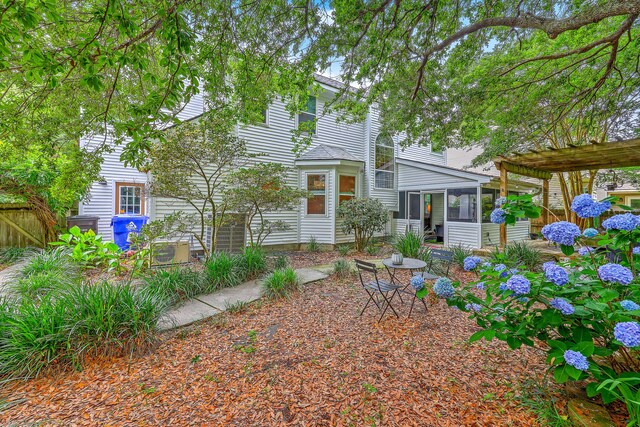 1972 Gray Battery Ct, Mount Pleasant, SC 29464 - rear view of property featuring a sunroom