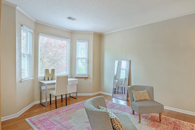 1972 Gray Battery Ct, Mount Pleasant, SC 29464 - office area featuring light wood finished floors, a textured ceiling, and ornamental molding