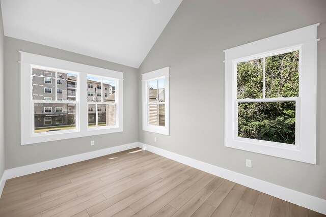 101 Hanover St, Charleston, SC 29403 - empty room featuring wood finished floors, plenty of natural light, and high vaulted ceiling