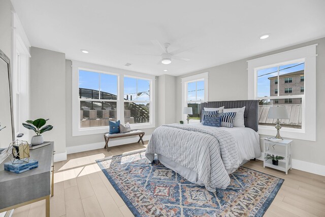 101 Hanover St, Charleston, SC 29403 - bedroom with multiple windows, light wood finished floors, a ceiling fan, and recessed lighting