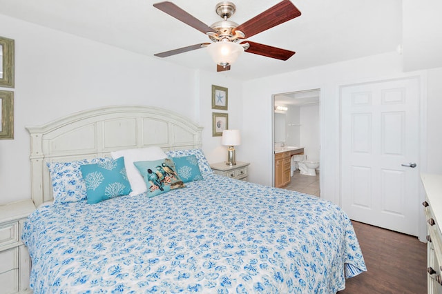 bedroom featuring connected bathroom, ceiling fan, and dark hardwood / wood-style floors