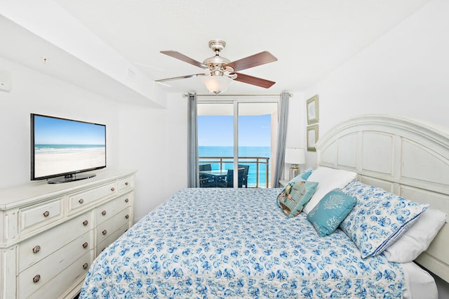 bedroom with access to exterior and ceiling fan