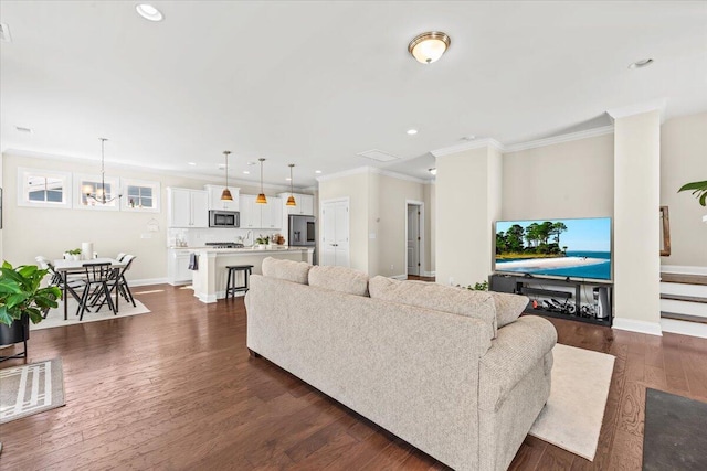 living area with recessed lighting, crown molding, dark wood finished floors, baseboards, and a chandelier
