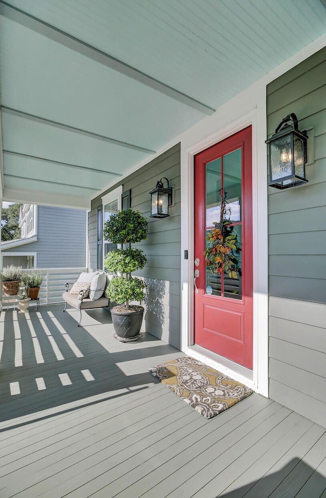 entrance to property with a porch