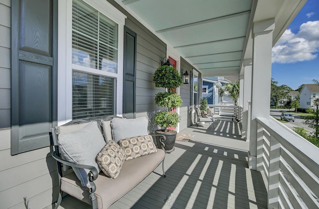 view of patio featuring a porch