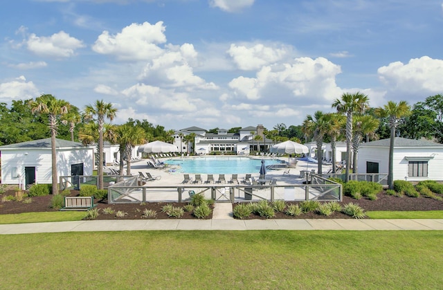 community pool featuring a patio area