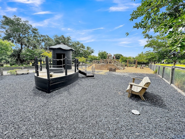 view of play area with fence