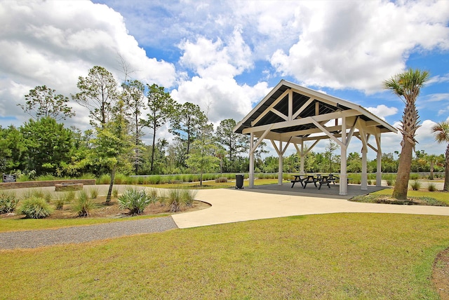 view of property's community featuring a gazebo and a lawn