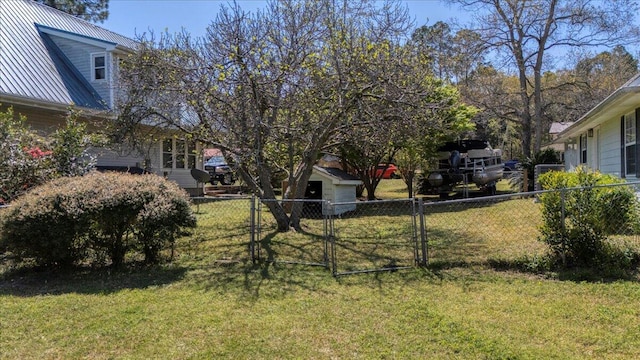 view of yard featuring fence private yard and a gate