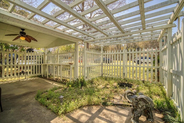 view of patio / terrace with fence, a pergola, and ceiling fan