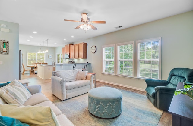 5433 Falling Tide, North Charleston, SC 29420 - living room featuring ceiling fan, light wood-style floors, recessed lighting, and baseboards