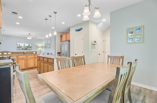 5433 Falling Tide, North Charleston, SC 29420 - dining area with light wood-type flooring, ceiling fan, a chandelier, recessed lighting, and baseboards