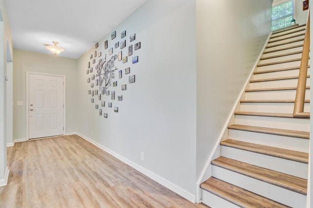 5433 Falling Tide, North Charleston, SC 29420 - entryway featuring stairs, wood finished floors, and baseboards