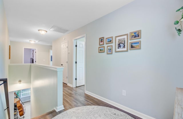 5433 Falling Tide, North Charleston, SC 29420 - corridor featuring an upstairs landing, wood finished floors, and baseboards