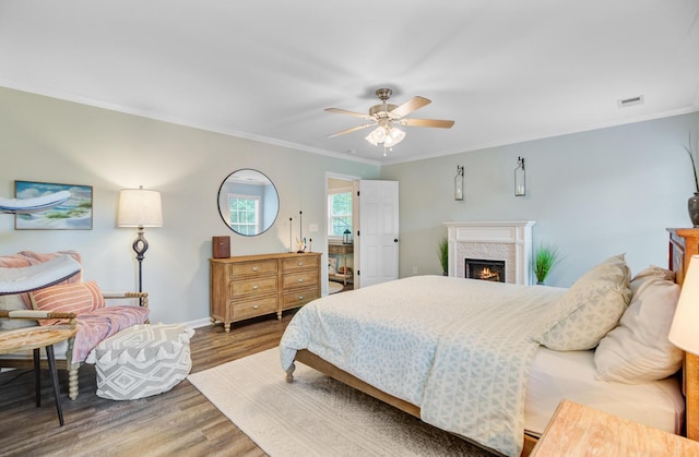 5433 Falling Tide, North Charleston, SC 29420 - bedroom featuring wood finished floors, baseboards, a premium fireplace, crown molding, and ceiling fan