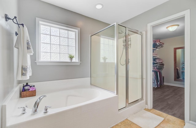 5433 Falling Tide, North Charleston, SC 29420 - bathroom with a shower stall, a garden tub, a walk in closet, and tile patterned flooring