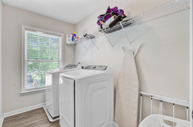 5433 Falling Tide, North Charleston, SC 29420 - washroom featuring washer and clothes dryer, wood finished floors, and baseboards