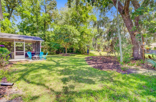 5433 Falling Tide, North Charleston, SC 29420 - view of grassy yard with a sunroom
