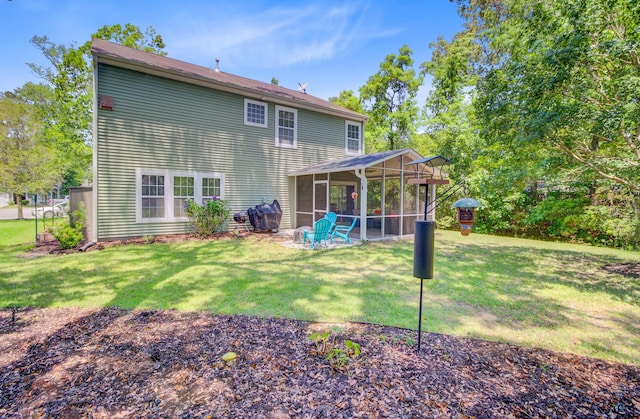 5433 Falling Tide, North Charleston, SC 29420 - back of property featuring a sunroom and a yard
