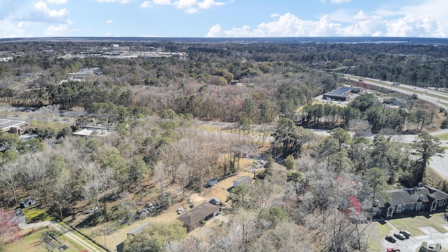 bird's eye view featuring a forest view