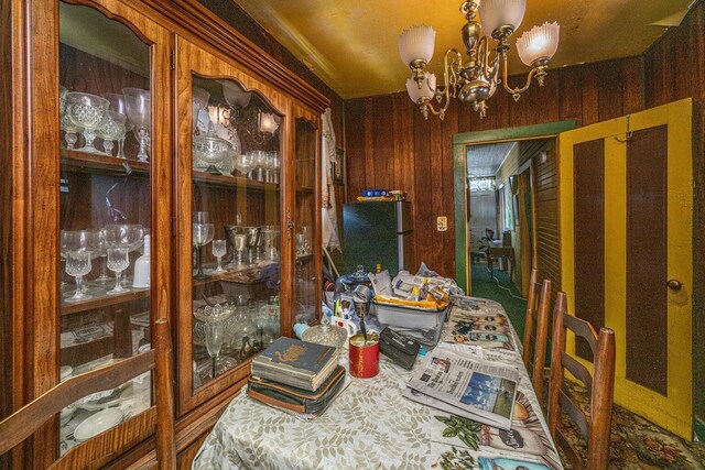 200 Fishburne St, Charleston, SC 29403 - dining room with a chandelier and wooden walls