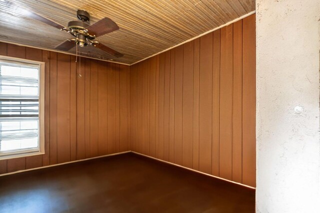 200 Fishburne St, Charleston, SC 29403 - spare room featuring wooden ceiling, plenty of natural light, a ceiling fan, and wood walls