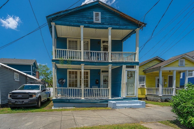 200 Fishburne St, Charleston, SC 29403 - view of front facade featuring covered porch and a balcony
