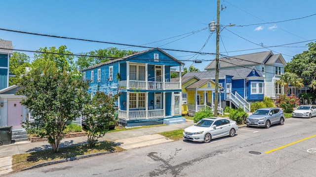 200 Fishburne St, Charleston, SC 29403 - townhome / multi-family property with covered porch and a balcony