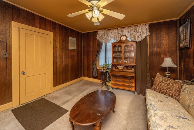200 Fishburne St, Charleston, SC 29403 - entryway with wooden walls, carpet floors, a ceiling fan, and crown molding