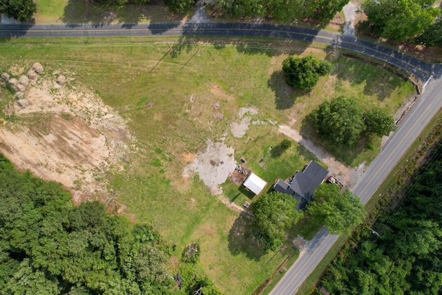 birds eye view of property featuring a rural view