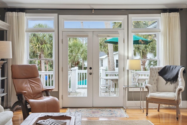 doorway featuring light hardwood / wood-style floors and french doors