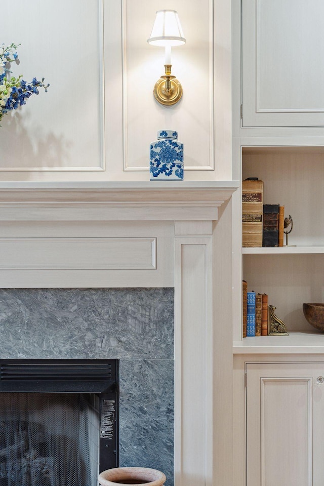 details featuring a high end fireplace