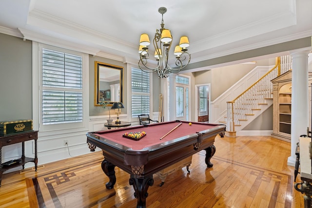 playroom with crown molding, hardwood / wood-style floors, a notable chandelier, pool table, and a raised ceiling