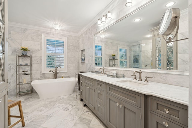 bathroom with tile walls, vanity, ornamental molding, and shower with separate bathtub