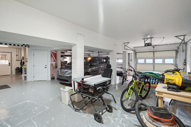 garage featuring a garage door opener