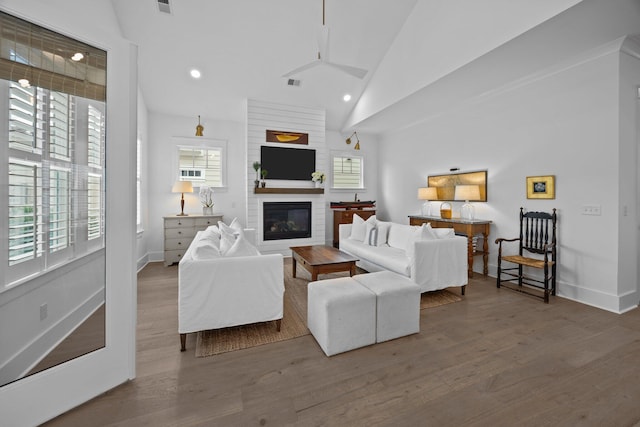 1557 Kepley Dr, Mount Pleasant, SC 29464 - living area with plenty of natural light, a large fireplace, wood finished floors, baseboards, and recessed lighting