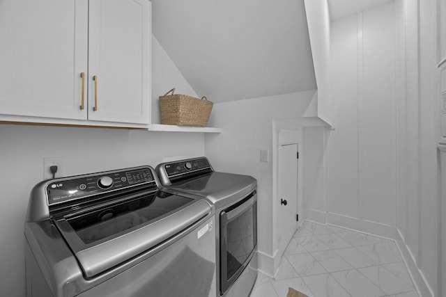 1557 Kepley Dr, Mount Pleasant, SC 29464 - washroom featuring light marble finish flooring, washing machine and clothes dryer, cabinet space, and baseboards