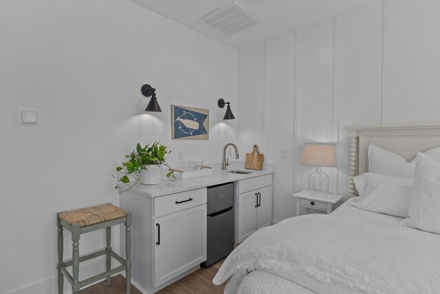 1557 Kepley Dr, Mount Pleasant, SC 29464 - bedroom featuring freestanding refrigerator, a sink, and wood finished floors