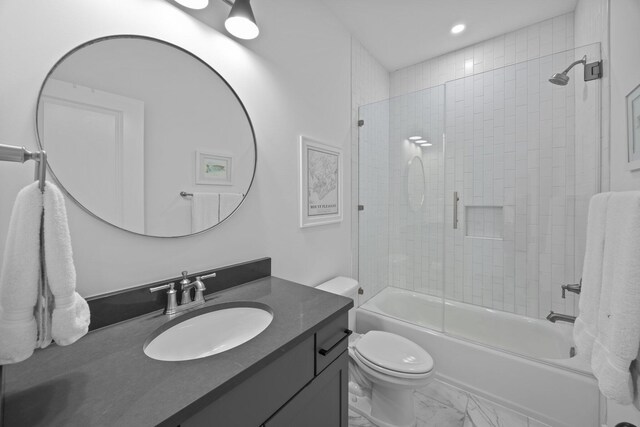 1557 Kepley Dr, Mount Pleasant, SC 29464 - bathroom featuring vanity, toilet, enclosed tub / shower combo, recessed lighting, and marble look tiles