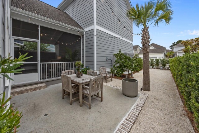1557 Kepley Dr, Mount Pleasant, SC 29464 - view of patio featuring outdoor dining space and a sunroom